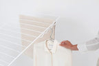 Brabantia HangOn Clothes Drying Rack | 82ft (25m) | White | Large Indoor Clothes Airer Laundry Stand with 2 Fold-Out Wings & Hanger Hooks, Folds Flat | Fits 2 Full Loads