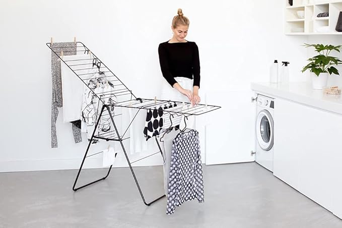 Brabantia HangOn Clothes Drying Rack | 82ft (25m) | Matt Black | Large Indoor Clothes Airer Laundry Stand with 2 Fold-Out Wings & Hanger Hooks, Folds Flat | Fits 2 Full Loads