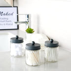 Amolliar 4 Pack Apothecary Jars Bathroom Vanity Storage Organizer Set -Countertop Canister with Stainless Steel Lids &Cute Stickers - Qtip Dispenser Holder for Qtips,Cotton Swabs,Makeup Sponges (Grey)