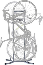 Bike Rack for Garage & Home by Delta Cycle - No Drilling Required - Fully Adjustable Gravity Storage Rack for Any Style Bicycle - Freestanding Vertical Rack