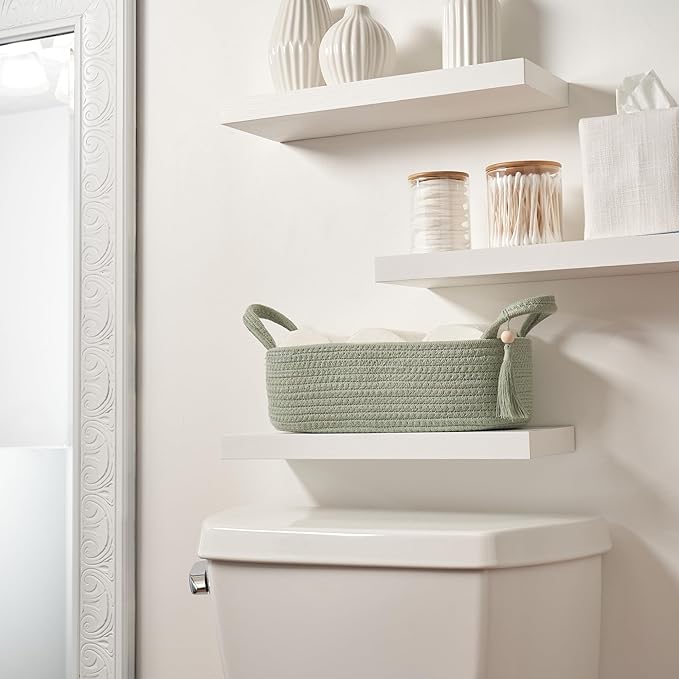 Decorative Toilet Paper Basket – Beautiful Bathroom Organizer for Toilet Tank Storage Decor – Boho Cotton Rope Bin with Tassel for Bathroom Accessories and as Shelf Decor (sage Green)
