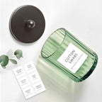 Amolliar Sage Green Glass Apothecary Jar With Metal Lid & Stickers, Bathroom Qtip Holder Dispenser for Cotton Swabs, Balls, Round Pads, Bath Salt, Floss, Countertop Canister Storage, Bronze 4 Pack
