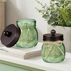 SheeChung Green Glass Qtip Holder Dispenser, Mason Jar Apothecary Jars with Lids, Bathroom Organizers and Storage, Vanity Countertop Canisters Set for Cotton Swab, Ball, Pad, Floss Pick-Bronze, 3 Pack
