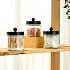 SheeChung Bathroom Organizers and Storage - 4Pack Qtip Holders Bathroom Canister Apothecary Jars for Cotton Swabs, Rounds, Balls, Qtips,Makeup Sponges, Flossers,Bath Salts - Black