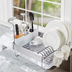 KitchenAid Full Size Compact to Full Capactiy Expandable Rust Resistant Dish Rack, with Self Draining Angled Drainboard and Removable Flatware Caddy, 24-Inch, White